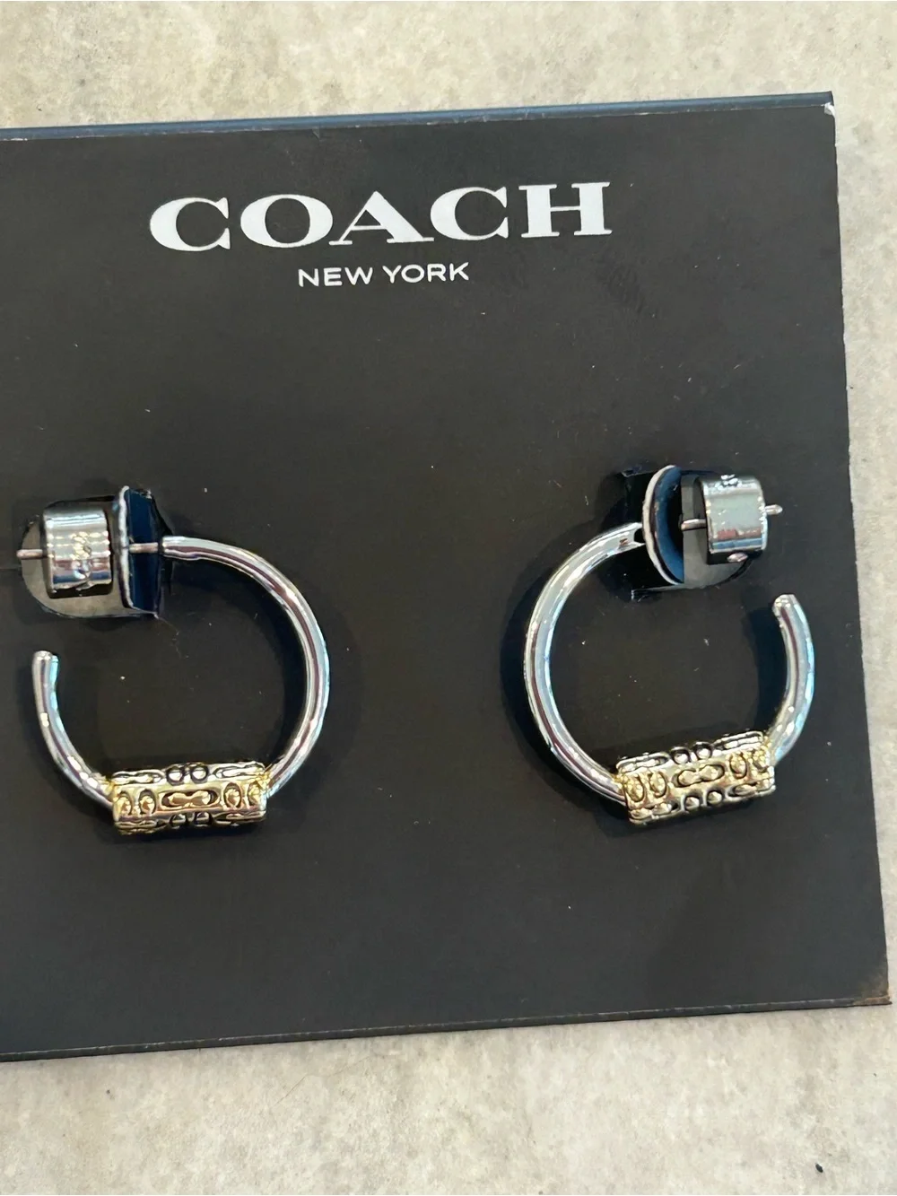 Coach Two-Tone Silver Hoop Earrings with Gold Engraved Barrel